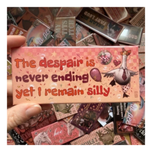 Przypinka 54×120 mm The despair is never ending yet I remain silly