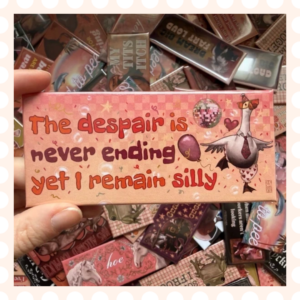 Przypinka 54×120 mm The despair is never ending yet I remain silly